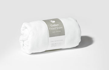 Lotus Crib Cotton Fitted Sheet in packaging